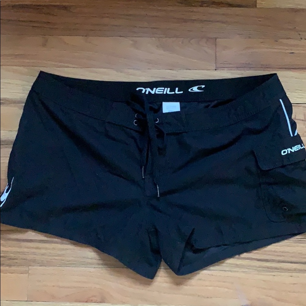 O’Neill black and white board shorts.